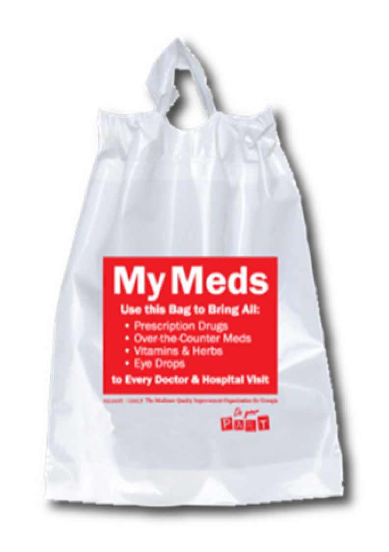 Person holding an alliant health solutions medicine bag